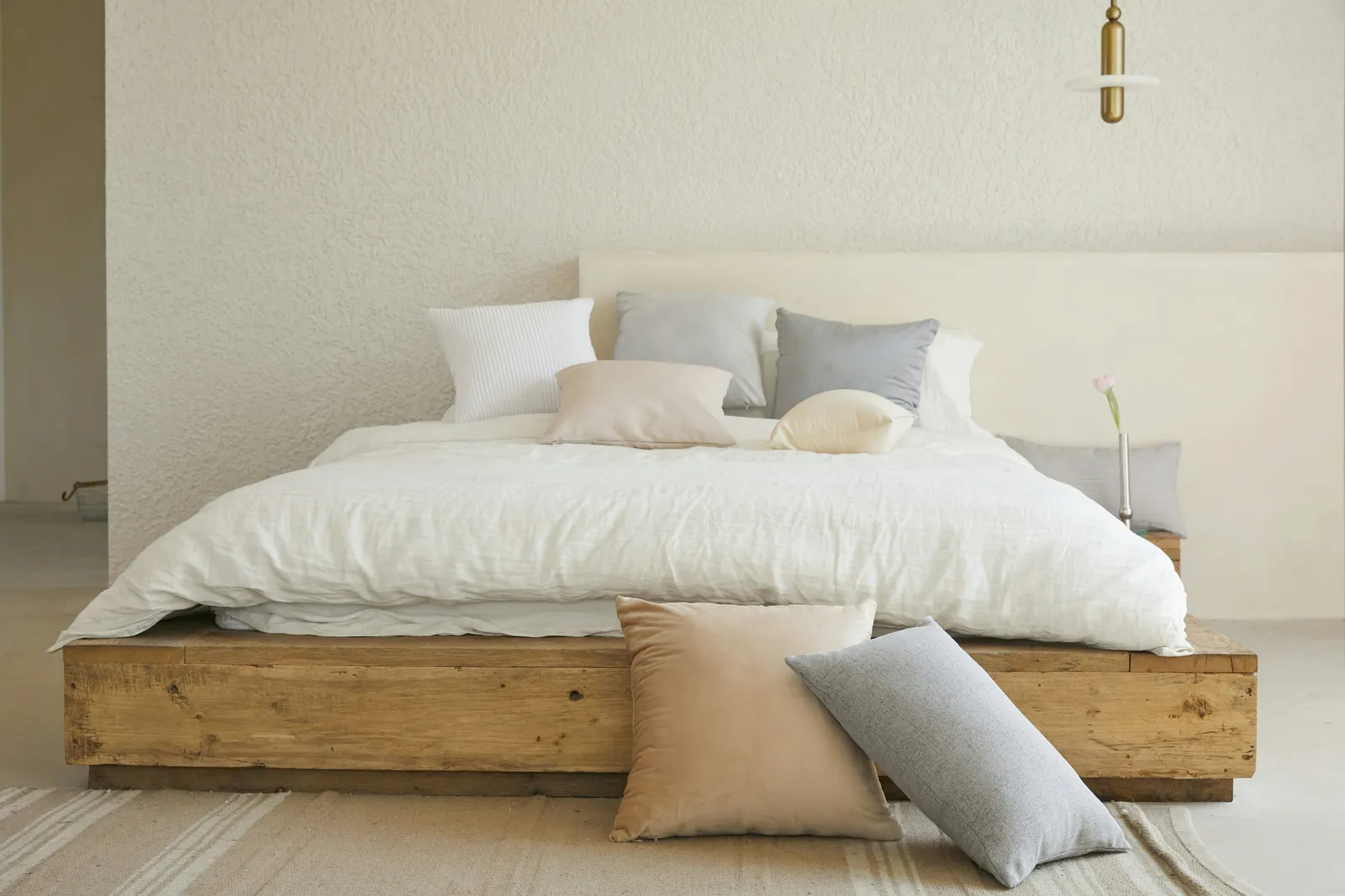 Professionally staged bedroom with neutral décor and minimalist furniture prepared for a home sale