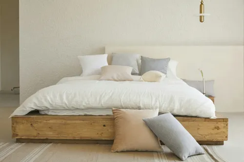 Professionally staged bedroom with neutral décor and minimalist furniture prepared for a home sale