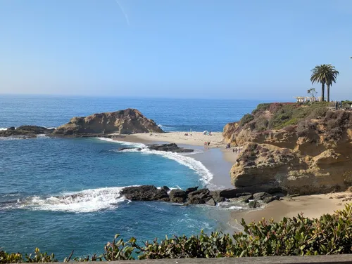 Clifftop coastal view of Laguna Beach — rocky coves and turquoise Pacific water in Southern California