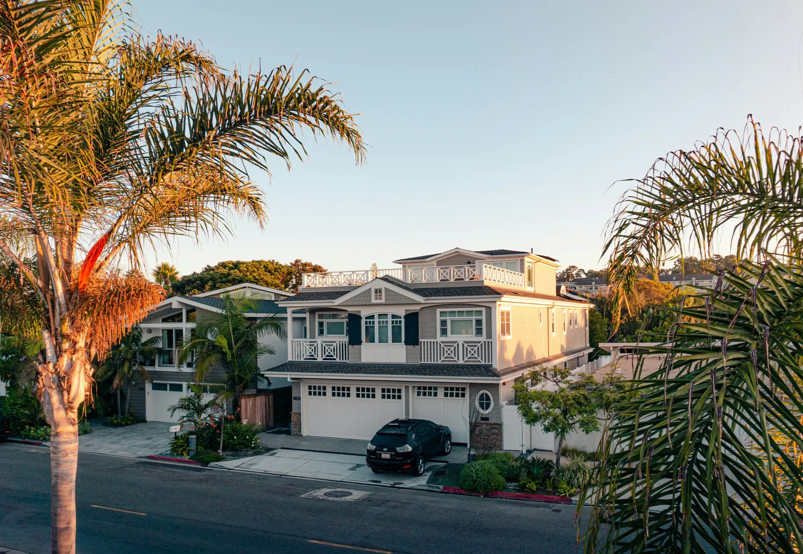 Southern California hillside with residential neighborhoods and palm trees